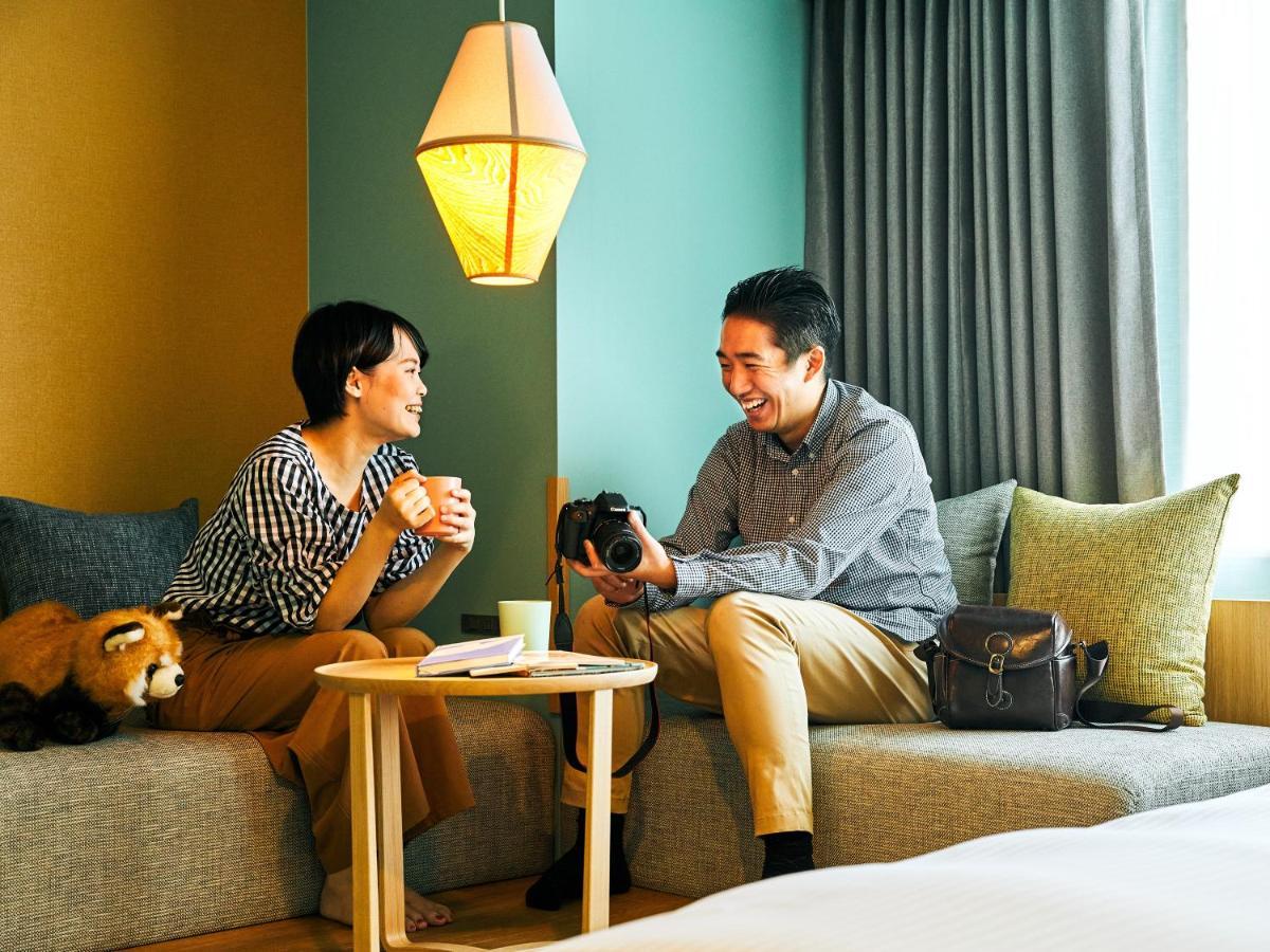 Omo7 Asahikawa By Hoshino Resorts Zewnętrze zdjęcie A couple at a hotel